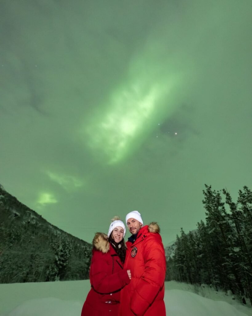 Northern Lights chase - us with the Aurora in the background. 