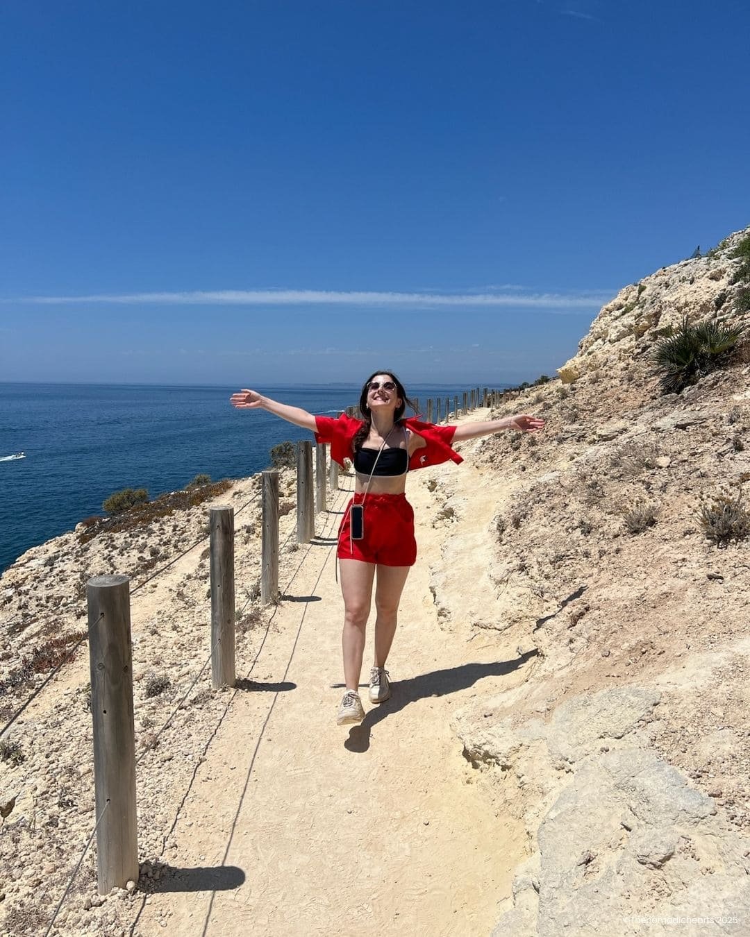 Me walking on a section of the Seven Hanging Valleys Trail, showcasing the diverse terrain.