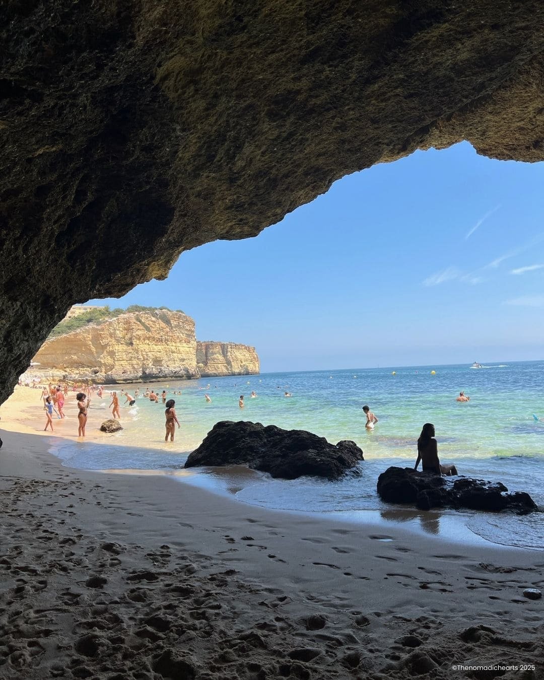 View of the beach where the trail ended, from a small cave near the shore.