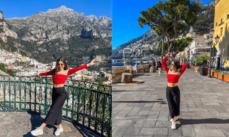 Rumi soaking up the sun and cliffside vibes on the Amalfi Coast.