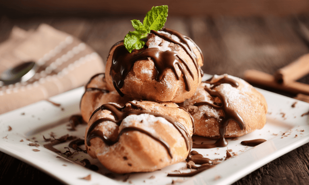 What to Eat in Athens (2026): The Local Dishes We Wish We Found Sooner What to eat in Athens Local Food Guides Profiteroles (Freshly Built) - what to eat in Athens