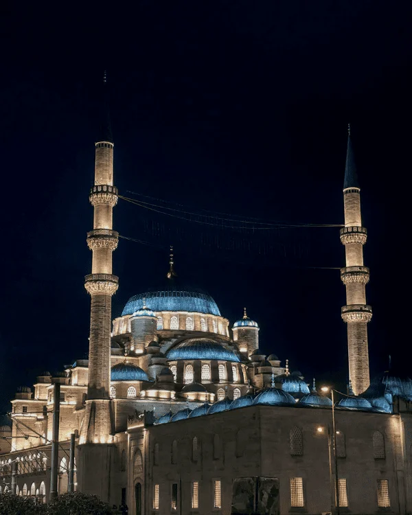 The Yeni Mosque (New Mosque) in the night, Istanbul, Turkey