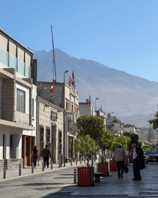Colca Canyon Day Tour from Arequipa: Our Honest 2026 Review Colca Canyon day tour from Arequipa Peru A street in Arequipa with the volcano behind, Peru