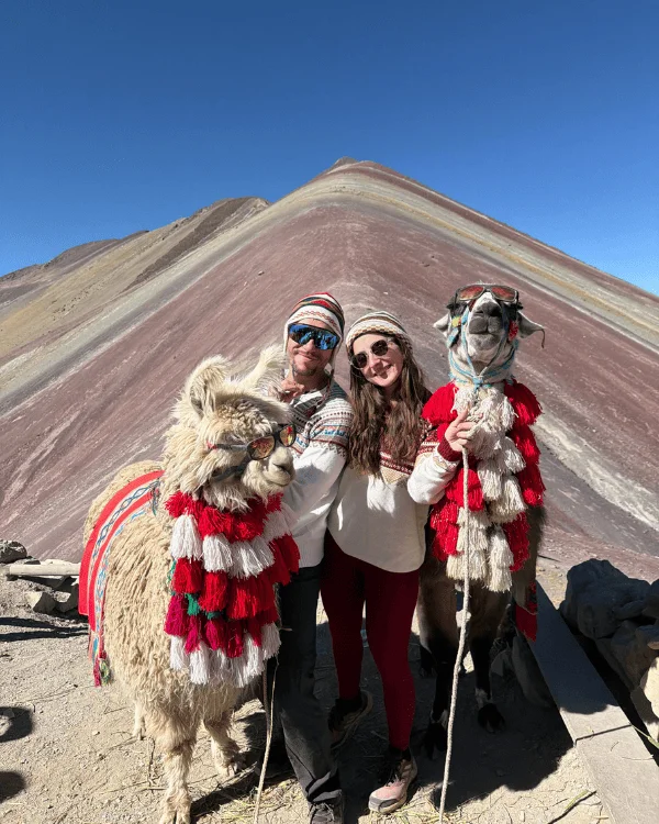 A selfie with a lama and an alpaca at Rainbow Mountain, Peru