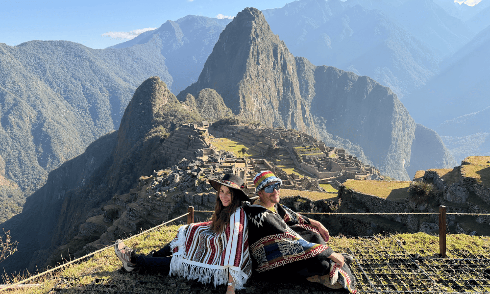 Alpaca Expeditions Inca Trail Review (2026): Our 4-Day Experience & Costs Alpaca Expeditions Inca Trail Review Peru Rumi & Tiago in front of Machu Picchu, Peru