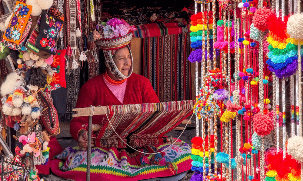What to Buy in Peru: 22 Souvenirs & Gifts We Actually Brought Home (2026) what to buy in Peru Peru Pompoms at a market in Peru